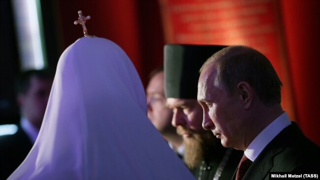 Владимир Путин и руския патриарх Кирил