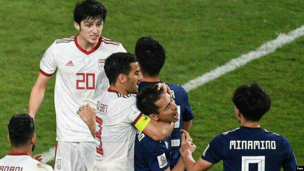 Iranian striker, Ehsan Haj safi, clashes with Japan football player, January 28, 2019.