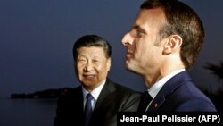 Эммануэл Макрон менен Си Цзинпин. Париж. 25-март, 2019-жыл. 