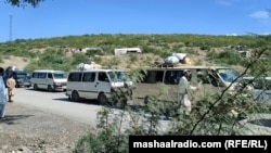 A convoy moves under police escort in Kurram district earlier this month. 