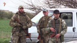 На въезде в Геническ дежурят украинские силовики (видео)
