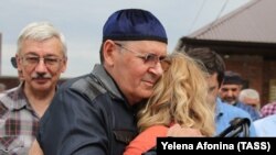 Oyub Titiyev is welcomed after being released in Argun on June 21.