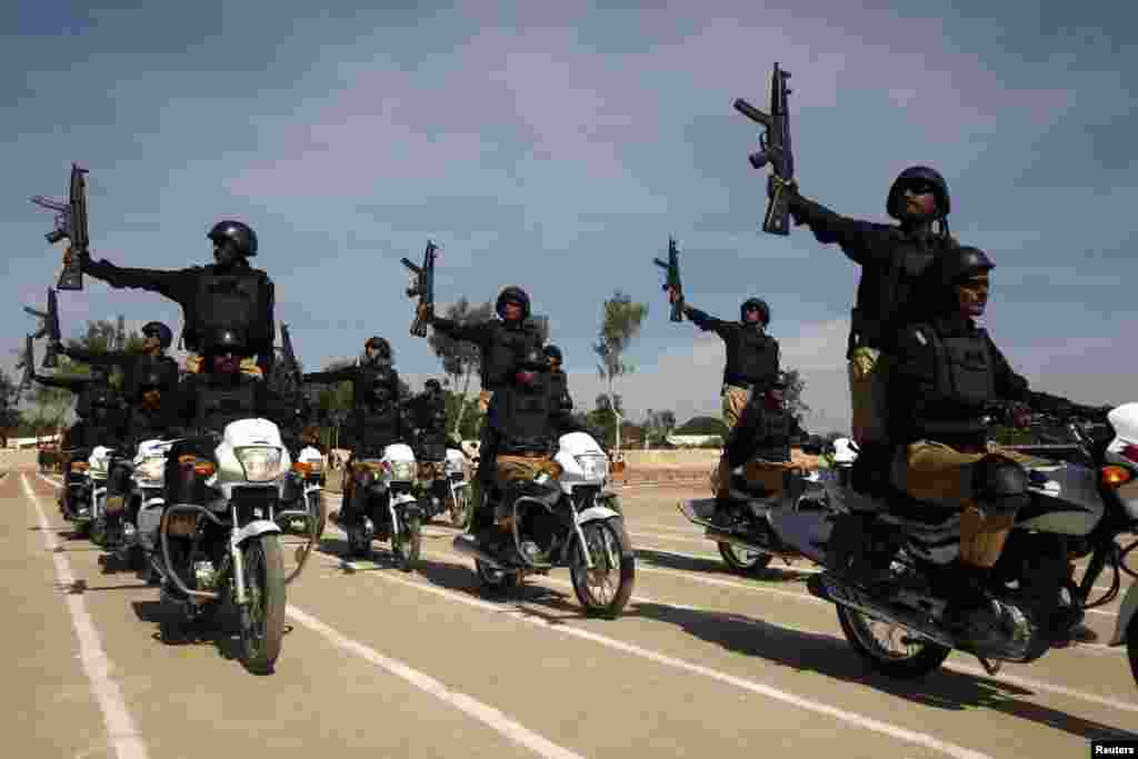 Cadets display their skills during a passing-out parade upon the completion of their basic training at the Shaheed Benazir Bhutto Elite Police Training Centre in Karachi, Pakistan. (Reuters/Athar Hussain)