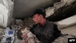 После бомбардировки города Дума, который контролируют повстанцы (9 сентября 2016 года)