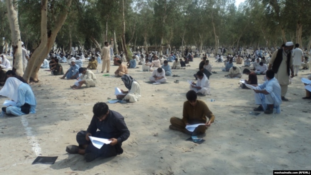 Afghan students take an entrance exam for a Laghman Province technical school. Access to higher education is extremely limited in Afghanistan.