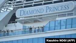 Круизный лайнер Diamond Princess, пришвартованный в порту Иокогама. 13 февраля 2020 года.