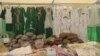 Turkmenistan. School market in Ashgabat. Shoes, bags, dresses, hats. August 2018