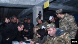 Armenia -- Armenian volunteers receive uniforms and weapons at a military commissariat to join the self-defense army of Nagorno-Karabakh in Yerevan, April 2, 2016