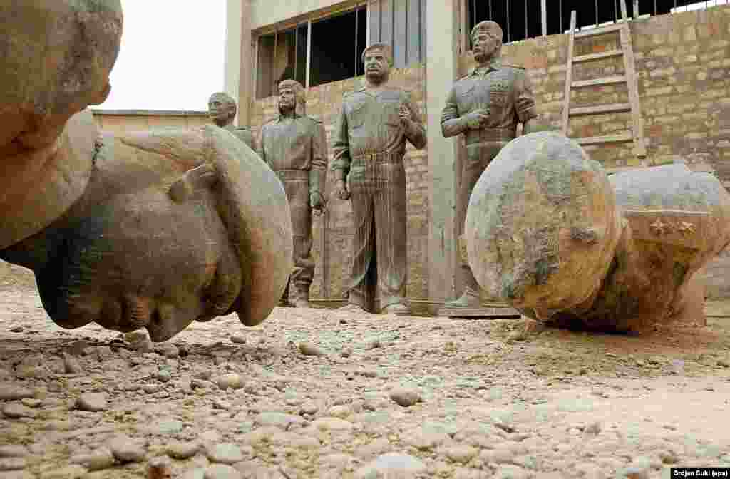 Statues and busts of Iraqi President Saddam Hussein in a factory that produced the likenesses in April 2003. 