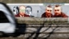 A Tuse nevű művész által készített, a Klicsko fivéreket (j), valamint Hitlert, Putyint és Sztálint ábrázoló falfestmények a lengyelországi Gdańskban 2022. március 22-én