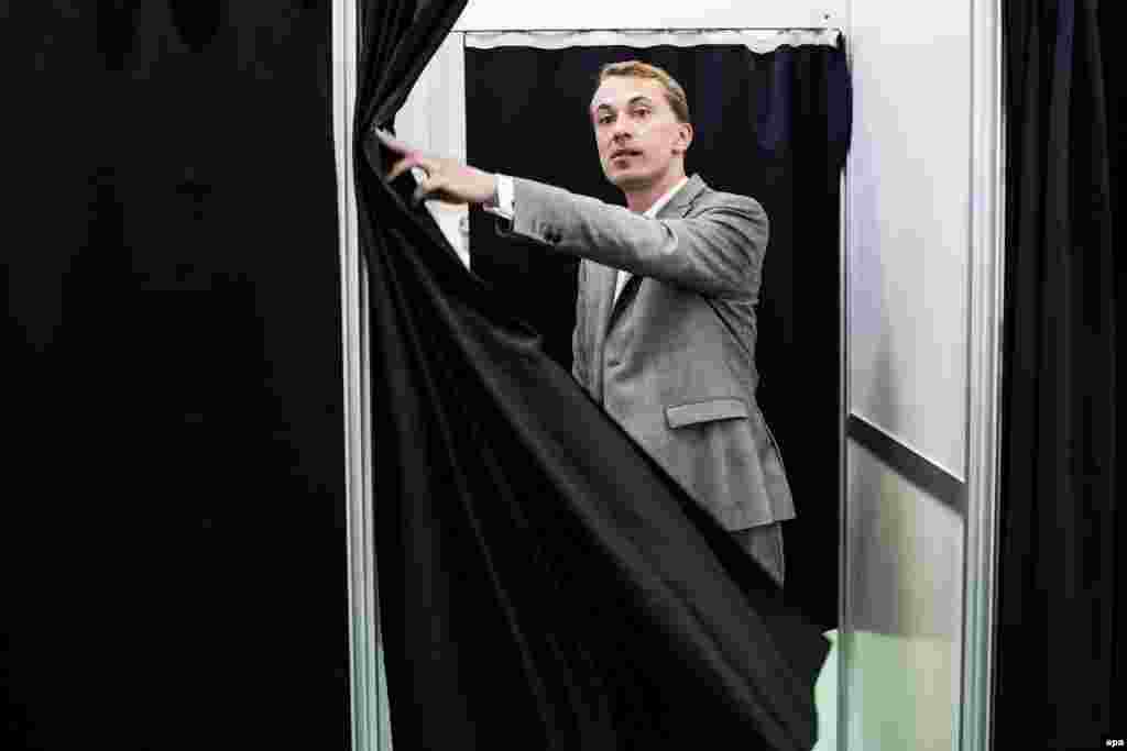 Candidate Morten Messerschmidt of the far-right Danish People's Party (DPP) casts his vote in Ordrup, Denmark. The party which won the largest share of its country's vote. 