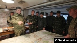 Ukrainian President Petro Poroshenko (left) visits the restive Donbas region on June 20