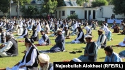 Worshippers offering the special prayer for Eid Al-Fitr in the southeastern province of Khost on April 24.
