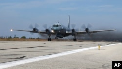 An Il-20 electronic-intelligence plane takes off from the Russian airbase in Hmeimim in November 2015.