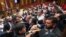 Armenia - Opposition (left) and pro-government lawmakers clash on the parliament floor, Yerevan, October 6, 2026.