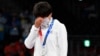 Олимпиадада күміс алған қырғыз балуаны Айсұлу Тыныбекова марапаттау рәсімінде тұр. Токио, 4 тамыз 2021 жыл.