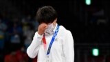 Tokyo 2020 Olympics - Wrestling - Freestyle - Women's 62kg - Medal Ceremony - Makuhari Messe Hall A, Chiba, Japan - August 4, 2021. Silver medallist Aisuluu Tynybekova of Kyrgyzstan reacts REUTERS/Piroschka Van De Wouw