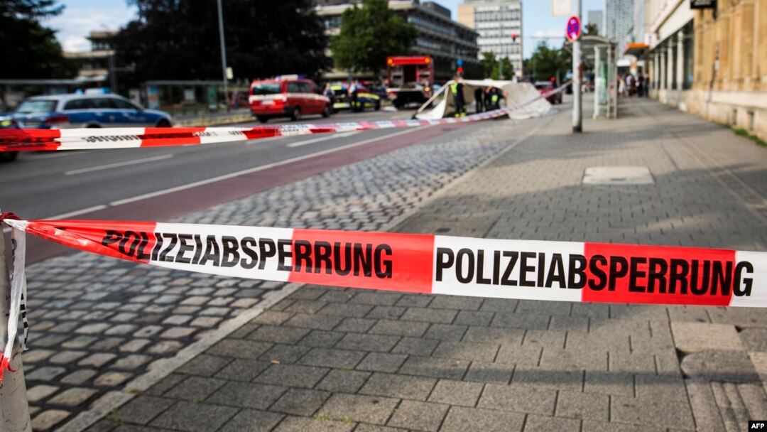 A police line is seen near the site where a Syrian asylum seeker killed a woman and injured two people with a machete in Reutlingen, southern Germany, on July 24. 
