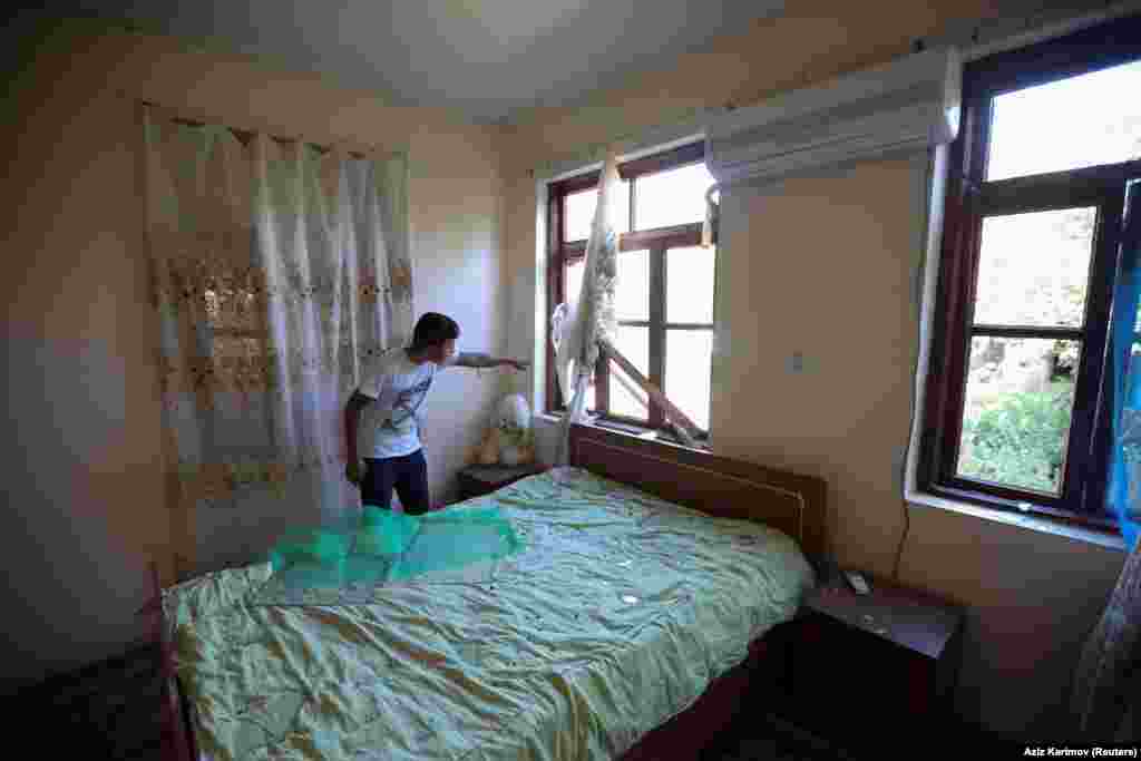 Damage to a house in the Azerbaijani village of Dondar Gushchu on July 15