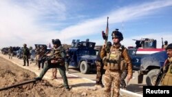 Iraqi security forces during clashes with Al Qaeda-linked militants in the city of Ramadi, 100 kilometers west of Baghdad, February 2.