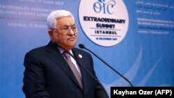 Palestinian leader Mahmud Abbas calls for the United Nations to replace the United States as Middle East mediator.