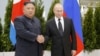 Russian President Vladimir Putin and North Korea's leader Kim Jong Un shake hands during their meeting in Vladivostok, Russia, on April 25, 2019.