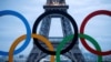 FILE PHOTO: Olympic rings to celebrate the IOC official announcement that Paris won the 2024 Olympic bid are seen in front of the Eiffel Tower at the Trocadero square in Paris