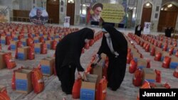 Food aid packages placed at Khomeini’s luxurious shrine to show the establishment cares for people in need, while inflation hovered at 40 percent. May 12, 2020