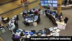 Reporters of Hispan TV in the newsroom. FILE PHOTO.