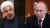 ولادیمیر پوتین (راست)، رئیس‌جمهوری روسیه، و حسن روحانی، همتای ایرانی‌اش.