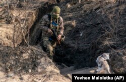 A Ukrainian soldier at the line of contact in Zolote in Ukraine's eastern Luhansk region on November 2. More than 13,000 civilians and combatants have been killed in the fighting.