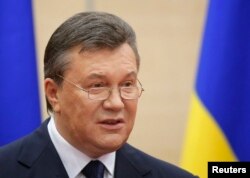 Ousted Ukrainian President Viktor Yanukovych makes a statement during a news conference in the southern Russian city of Rostov-on-Don on March 11, 2014.