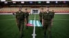 Abkhaz soldiers practicing flag-raising as part of preparations for the Conifa soccer tournament, which kicks off in the Georgian breakaway region on May 28.