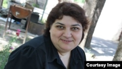 Khadija Ismayilova denounced the charges of libel, tax evasion, illegal business activity, and abuse of power as a "scam" aimed at silencing her investigative reporting.