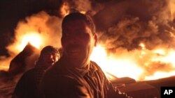 Пожар нефтехранилища во время боев в Мисурате