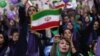 Supporters of the incumbent Hassan Rouhani chant slogans during an electoral campaign gathering in the northwestern city of Zanjan, May 16, 2017