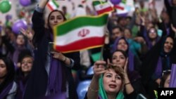 Supporters of the incumbent Hassan Rouhani chant slogans during an electoral campaign gathering in the northwestern city of Zanjan, May 16, 2017