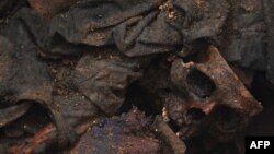 Рэшткі адной з ахвяраў. Масавае пахаваньне ў горадзе Гватэмала