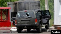 Обстріляне авто після бою біля Карлівки, 23 травня 2014 року
