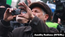 Azerbaijan. Baku. National Council's protest action in Baku - Mobile phone