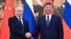 Președintele Chinei, Xi Jinping (D) l-a primit, la Beijing, pe președintele Rusiei, Vladimir Putin (S).
