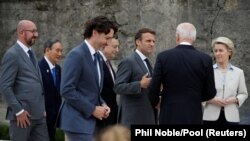 G7 лидерлері Англиядағы саммитте. 12 маусым 2021 жыл. 
