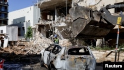 Urmările unui atac asupra orașului israelian Tel Aviv. 24 martie 2026.