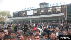 Tajikistan - Tens of passengers waiting to fly to Russia in Dushanbe airport at 29Mar2010