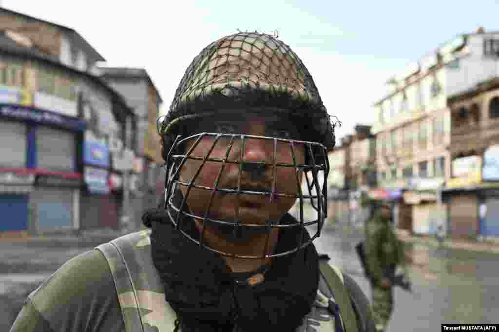 An Indian policeman on patrol in Srinigar on August 8. The change in the region&#39;s legal status means it will no longer be allowed to frame its own laws and nonresidents will be allowed to buy property in the territory.