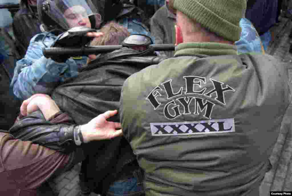 Police use force to disperse people who gathered on Pushkin Square in Moscow to take part in a March of Dissent. 14 April 2007.