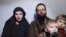 An image from a video posted by the Taliban on social media last year shows American Caitlan Coleman (left) with her Canadian husband, Joshua Boyle, and two of their sons.