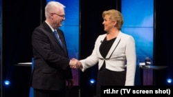 Ivo Josipović i Kolinda Grabar Kitarović nakon duela 