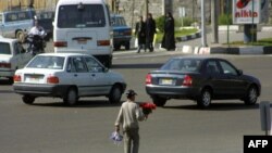 Many children sell flowers and small items in the streets of large cities in Iran. File photo