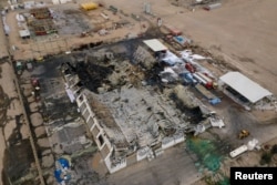 Последствия от атака с дрон срещу офиси и складове, използвани от американска фирма в Ирак. 7 март 2026 г.